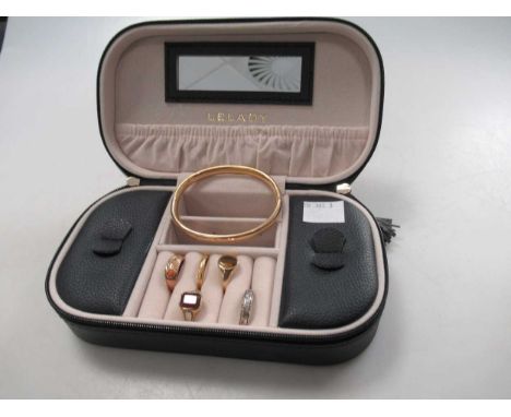 A jewellery box containing a half sovereign dated 1909 within a hallmarked 9ct gold mount on a chain, together with a hallmar