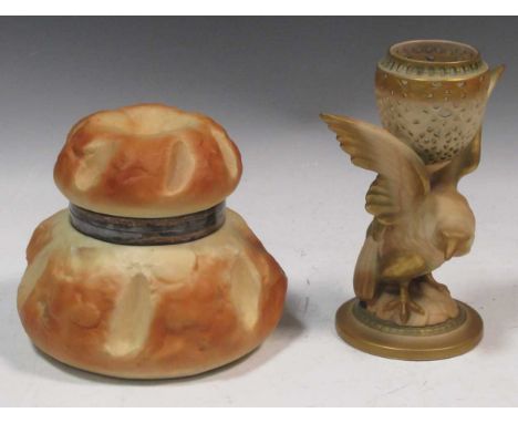 A Royal Worcester preserve pot in the form of a bread roll and a Royal Worcester vase modelled as an eagle supporting a pierc
