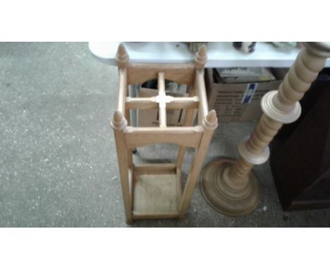 A light oak four division stick stand