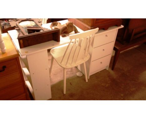 A Melamine three drawer desk with a pair of white painted stick back chairs