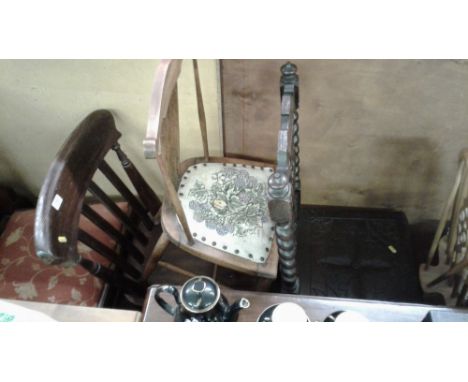 A stained pine slat back kitchen chair together a Victorian oak hall chair and a stick back kitchen chair