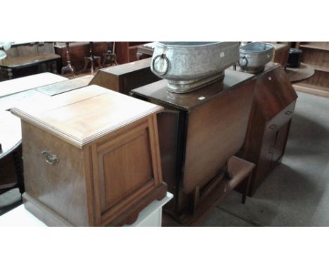 An oak veneered drop leaf table; a coffee table and a Victorian mahogany commode