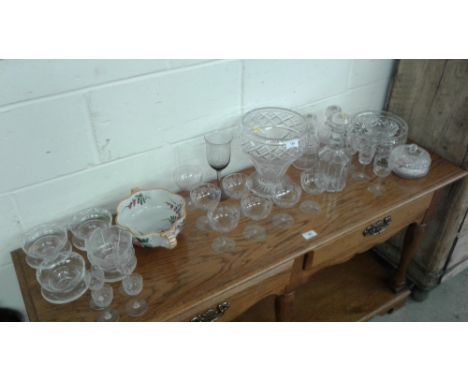 A large cut glass pedestal bowl together with a quantity of various other glassware to include champagne glasses etc.