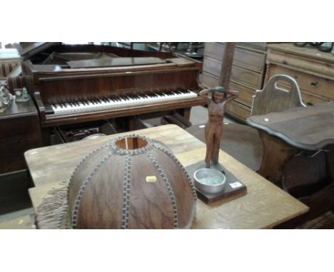 An Eastern carved wooden figural mounted table lamp and shade