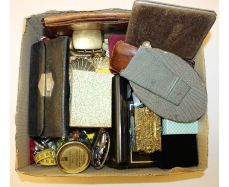 A box of various sundries to include marbles; a corkscrew and various sundries
