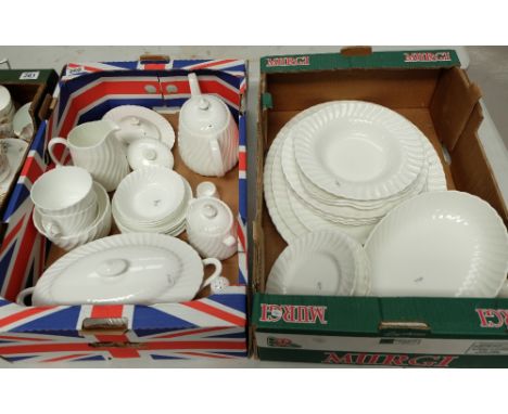 A large collection of Minton undecorated dinner and tea ware to include cups, saucers, teapot, tureen, server etc (2 trays)