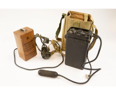 A post WWII military No 88 Type B portable wireless set, in its webbing carrying case with metal sheet of working instruction