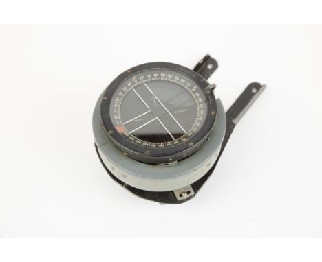 A WWII Type P11 Naval compass, with mounting bracket. GC £30-40 
