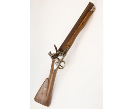 A flintlock musketoon, converted from a Brown Bess musket, 29½" overall, cut down barrel 14" with slightly flared muzzle, rou