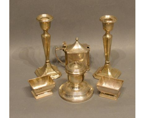 A Pair Of Chester Silver Candlesticks, together with a Birmingham silver inkwell, a Chester silver mustard and a pair of Birm