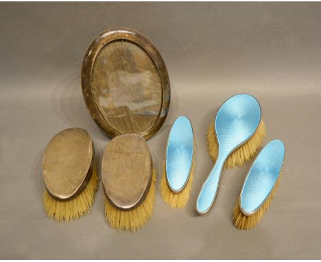 A Birmingham Silver And Blue Enamel Three Piece Dressing Table Set, together with a pair of similar London silver backed brus