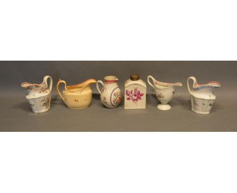 An 18th Century English Porcelain Jug, together with four other similar jugs and a tea caddy 