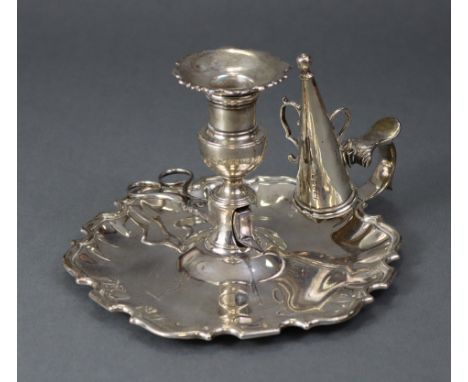 A George III silver large chamber candlestick, the short baluster column with removable drip-pan, on wide circular base with 