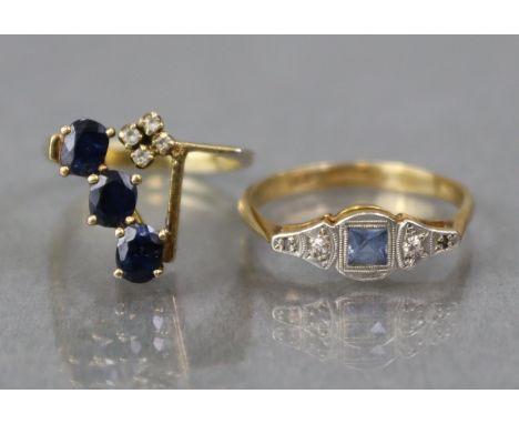 An 18ct. gold ring set square-cut pale sapphire with two small diamonds either side, size: Q/R (3gm); &amp; a silver-gilt rin