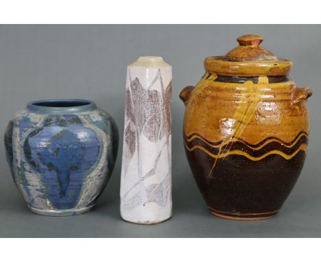 A slip-decorated studio pottery ovoid jar &amp; cover by Joy Nightingale (1908-2008), 11” high (chip to cover); a blue-glazed
