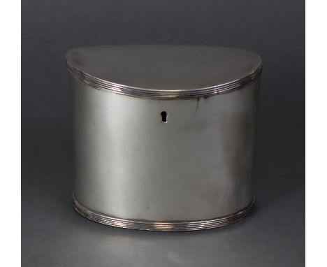 A 19th century Dutch silver (.833 standard) plain oval straight-sided tea caddy with slightly concave hinged lid &amp; reeded