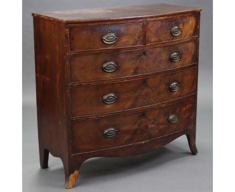 An early 19th century mahogany bow-front chest, fitted two short &amp; three long graduated drawers with later brass oval han