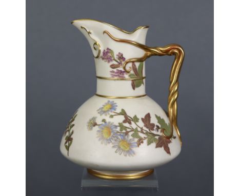 A Royal Worcester squat round ewer of blush ivory ground, decorated with floral sprays, the gilt handle modelled as a twistin