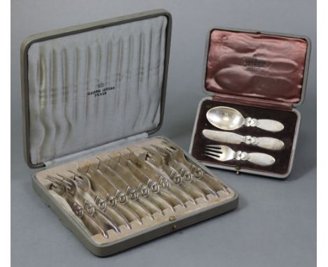 A set of six Georg Jensen “Cactus” design silver knives &amp; forks, London import marks for 1937, in fitted case; &amp; a th