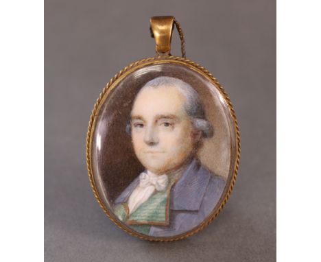 ENGLISH SCHOOL, 19th century. A portrait miniature of a gentleman wearing blue coat with green lapels, 1¾” x 1¼” (oval), in p