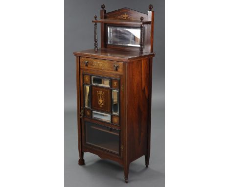 A Victorian inlaid rosewood upright side cabinet, with raised back set bevelled mirror with ebonised border &amp; on turned s