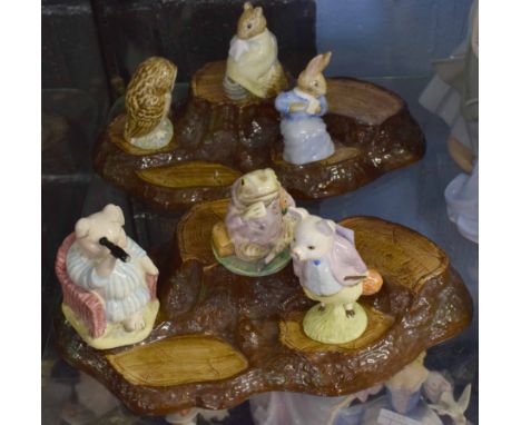 Group of Beswick wares from Beatrix Potter including Pigling Bland, Jeremy Fisher and Little Pig Robinson spying, all on a wo