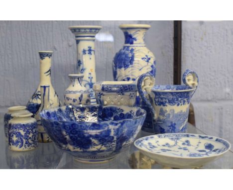 Group of 18th/19th century blue and white wares including some Continental porcelain candlesticks, Japanese porcelain vases, 