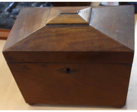 Victorian mahogany sarcophagus shaped tea caddy, lifting lid enclosing two lidded compartments, 18.5cm wide