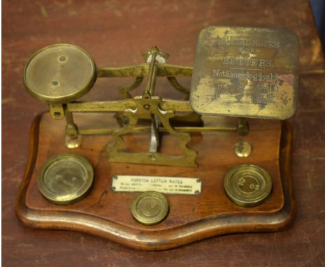 Set of vintage Victorian postal scales with weights