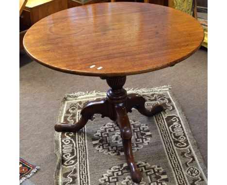 Victorian mahogany circular pedestal table, with wrythen and ring turned column terminating in a tripod base with hoof feet, 