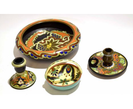 Collection of Gouda pottery wares comprising a large bowl, candlestick, two candlestick holders and a further small bowl with