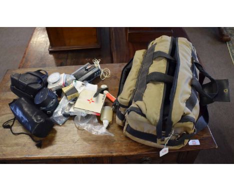 Holdall containing various camera equipment including Olympus OM10 camera, various accessories etc