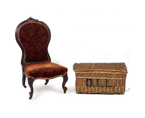 A VICTORIAN ROSEWOOD FRAMED UPHOLSTERED LOW CHAIR with scrolling cabriole front legs and ceramic casters, 53cm wide x 52cm de