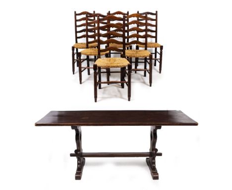  A SET OF SIX OAK LADDER BACK DINING CHAIRS with woven seats, 43cm wide x 99cm high together with an oak refectory table with