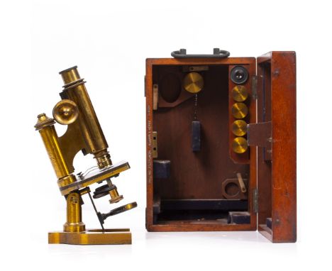 A LATE 19TH CENTURY CONTINENTAL STYLE MICROSCOPE by R  &amp; J Beck Limited of London numbered 20939 (1897), with rack and pi