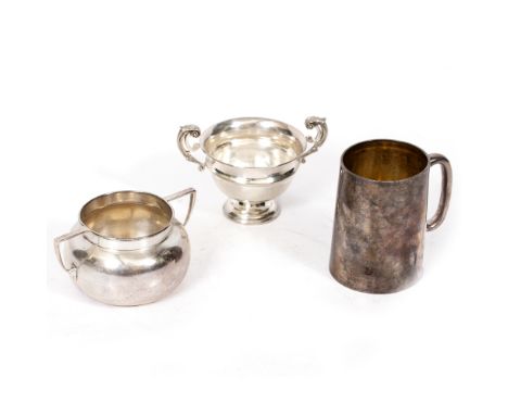 A SILVER SUGAR BASIN 9cm diameter and 101.8 grams in weight together with a small silver trophy cup with scrolling handles, 8