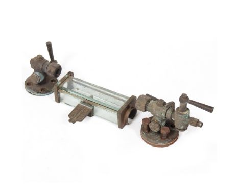 AN OLD BRASS STEAM ENGINE, POSSIBLY STEAM LOCOMOTIVE, WATER LEVEL INDICATOR COCKS and protective glass with 'water level indi