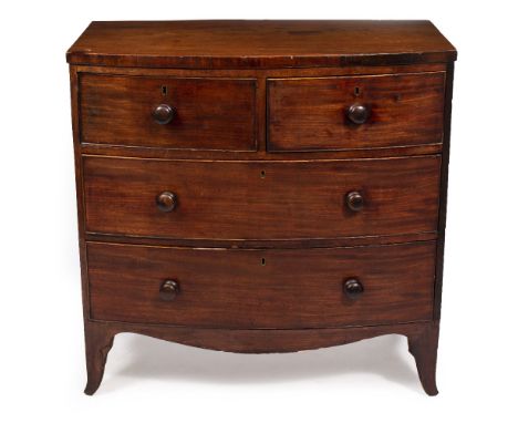 A SMALL SIZE 19TH CENTURY MAHOGANY BOW FRONTED CHEST OF TWO SHORT AND TWO LONG DRAWERS with turned knob handles and splaying 