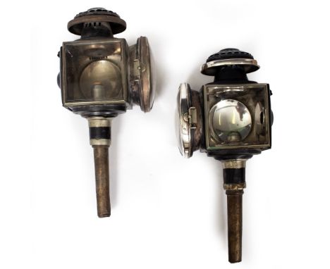 A PAIR OF LATE 19TH OR EARLY 20TH CENTURY CARRIAGE CANDLE LANTERNS by Howes &amp; Burley patent number 2070, with silvered fi