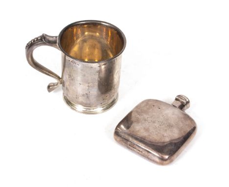 A VICTORIAN SILVER HEAVY HIP FLASK engraved with crest to one side and monogram to the other, with hinged lid, marked 'Elking