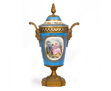 A SEVRES STYLE PORCELAIN POTPOURRI VASE AND COVER on a light blue ground decorated with floral sprays and with ormolu mounts 