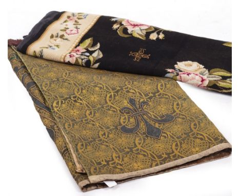 A SMALL NEEDLEWORK CARPET OR RUG of black ground with floral sprays within a floral border, 170cm long x 119cm wide together 