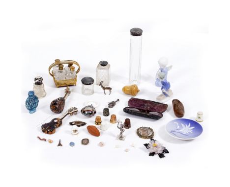 A COLLECTION OF BIJOUTERIE to include a white metal child's rattle, two tortoise shell miniature musical instruments, a Royal