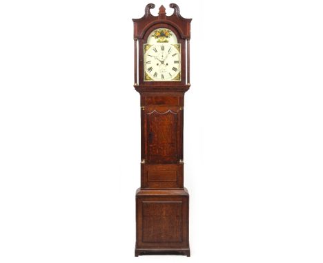 AN EARLY 19TH CENTURY OAK EIGHT DAY LONGCASE CLOCK with swan neck pediment and fluted pilaster columns to the hood, the trunk