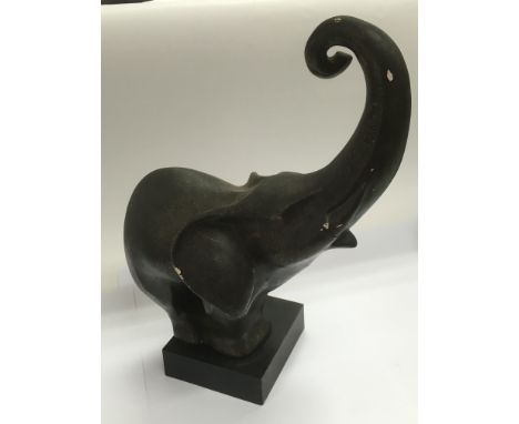A bronzed ceramic elephant, signed to reverse, approx 39.5cm.