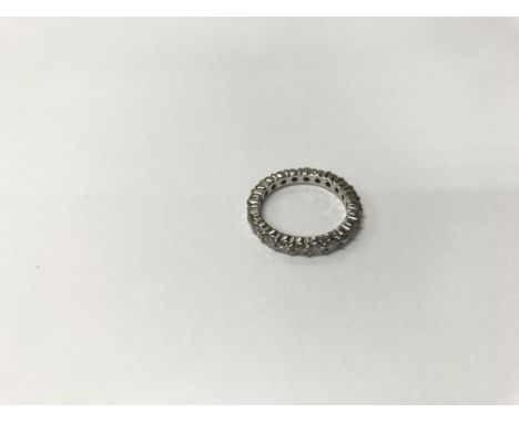 An unmarked white metal diamond ring. Weight approx 3.37g, size approx K.