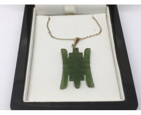 A jade pendant on chain, approx 4.1g.