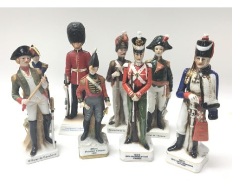 A collection of ceramic figures in the form of soldier figures.