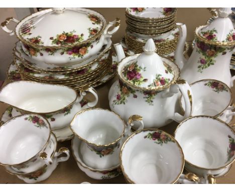 A Royal Albert Country rose tea / dinner service comprising cups sauces side plates dinner plates tureen tea pot coffee pot 4