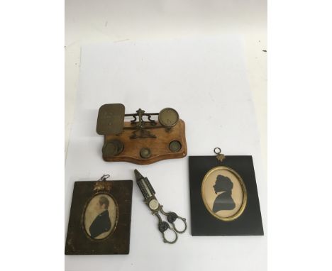 A set of small postal weighing scales, two portrait miniatures and a pair of candle snuffers